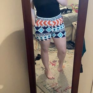 Navy, orange, teal, & white tribal print shorts